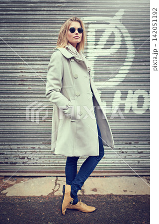 Fashion, portrait and woman with shades, wall and outdoor in street of New York, jacket and winter. Cool, female person and stylish, confidence and sunglasses with clothes in city, pride and warm Fashion, portrait and woman with shades, wall and outdoor in street of New York, jacket and winter. Cool, female person and stylish, confidence and sunglasses with clothes in city, pride and warm 142051192
