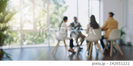 Business meeting, blurred background and people in office for teamwork, collaboration and planning, Partnership, negotiation and group in solidarity for growth, consulting and corporate solution 142051222