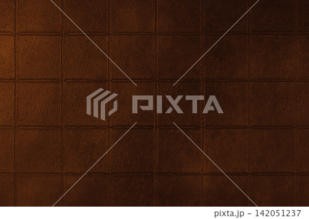 Dark orange ceramic tile texture, background with square geometric pattern, grunge surface 142051237