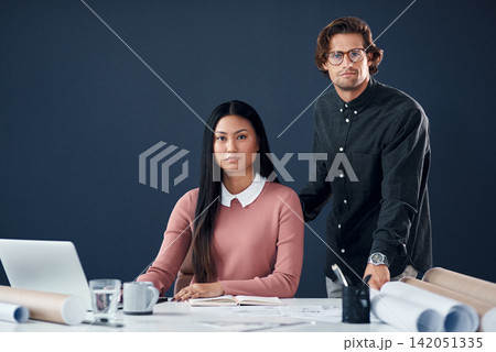 Architecture, portrait and man with woman, laptop and blueprint for creative ideas in building development. Partnership, confidence and architect team with computer, paperwork and support in office Architecture, portrait and man with woman, laptop and blueprint for creative ideas in building development. Partnership, confidence and architect team with computer, paperwork and support in office 142051335