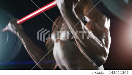 Man, bodybuilding and lifting weights for fitness workout on dark background for health, growth or muscle building. Male person, equipment and strength training for bicep exercise, gym or confidence Man, bodybuilding and lifting weights for fitness workout on dark background for health, growth or muscle building. Male person, equipment and strength training for bicep exercise, gym or confidence 142051361