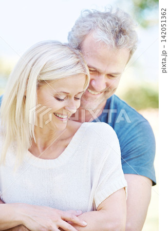Happy, hug and senior couple in garden for bonding, relationship and commitment outdoors on weekend. Love, retirement and mature man and woman embrace for romance, relaxing and marriage in nature Happy, hug and senior couple in garden for bonding, relationship and commitment outdoors on weekend. Love, retirement and mature man and woman embrace for romance, relaxing and marriage in nature 142051362