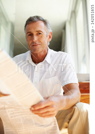 Mature, man and portrait with newspaper in home for morning reading with current events, politics or international. Male person, face and relax on steps in house or journalist report or stock market 142051655