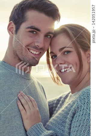 Portrait, couple and hug with love on beach for romantic getaway on weekend for anniversary and embrace on vacation. Man, woman and bonding together for intimacy or care, affection and summer holiday Portrait, couple and hug with love on beach for romantic getaway on weekend for anniversary and embrace on vacation. Man, woman and bonding together for intimacy or care, affection and summer holiday 142051957