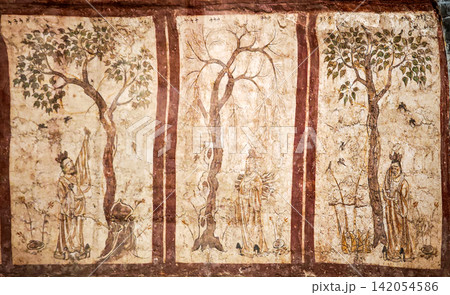 Ancient Chinese tomb frescoes, figures under tree panels from Tang dynasty GuoXing tomb exhibited in the Jinyang Ancient City Archaeological Museum, Taiyuan Shanxi China. Ancient Chinese tomb frescoes, figures under tree panels from Tang dynasty GuoXing tomb exhibited in the Jinyang Ancient City Archaeological Museum, Taiyuan Shanxi China. 142054586
