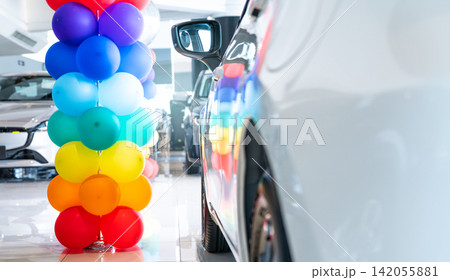 Car parked in luxury showroom. Car dealership office. Car showroom business. New car parked in modern showroom. Auto for sale and rent business. Automobile leasing and insurance. Electric automobile. Car parked in luxury showroom. Car dealership office. Car showroom business. New car parked in modern showroom. Auto for sale and rent business. Automobile leasing and insurance. Electric automobile. 142055881