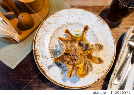 Traditional appetizer of Lithuanian cuisine pea beans fried or cooked in indoor grill with air fry Traditional appetizer of Lithuanian cuisine pea beans fried or cooked in indoor grill with air fry 142056572
