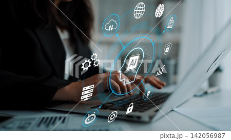 Business professional using a laptop with artificial intelligence icons and technology symbols in a modern office environment for digital transformation concept. Entropy Business professional using a laptop with artificial intelligence icons and technology symbols in a modern office environment for digital transformation concept. Entropy 142056987