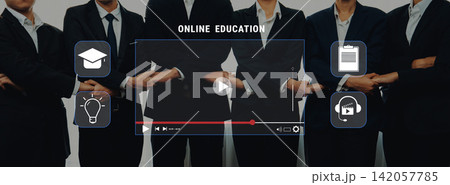 Professional group in business attire presenting online education concept with video, icons, and symbols for learning, training, and communication strategies Trope Professional group in business attire presenting online education concept with video, icons, and symbols for learning, training, and communication strategies Trope 142057785