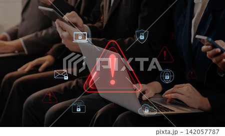 Business People Using Electronic Devices with Warning Icon and Security Symbols in Modern Office Setting Highlighting Cybersecurity Risks and Concerns. Raster 142057787