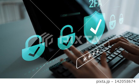 Secure Authentication with Two-Factor Verification Symbols Displayed on Computer Screen while User Types Password on Keyboard in Modern Office Setting Gluon 142058674