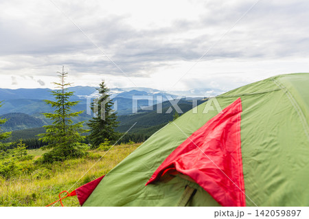 Camping in the Carpathians with a view of mountains and forest 142059897