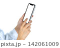 Doctor using a smartphone for telemedicine, digital healthcare, online consultation and hospital services. Healthcare apps, telehealth, patient communication and clinical service. Online medical care. 142061009