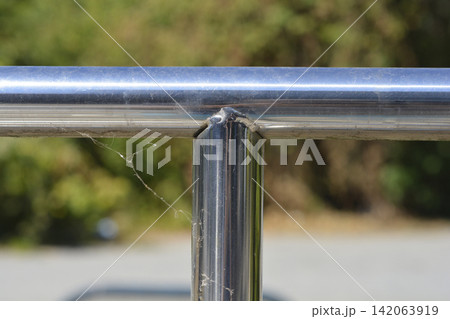 Stainless steel railing joint close up Stainless steel railing joint close up 142063919