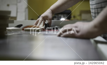 Small Carpentry Workshop Where Workers Skillfully Cut And Assemble Wood Pieces Safely And Rapidly. Media Small Carpentry Workshop Where Workers Skillfully Cut And Assemble Wood Pieces Safely And Rapidly. Media 142065042