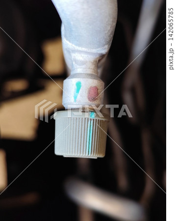 Freon filling pipe on car AC. Freon filling pipe on car AC. 142065785