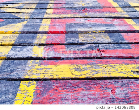 bridge made of painted wooden planks. 142065809