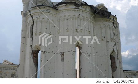 View to destroyed church at Kharkivska oblast. Ruined building after bomb attacks on ukrainian territory from russia army. Consequences of russian invasion of Ukraine. Slow motion View to destroyed church at Kharkivska oblast. Ruined building after bomb attacks on ukrainian territory from russia army. Consequences of russian invasion of Ukraine. Slow motion 142069703