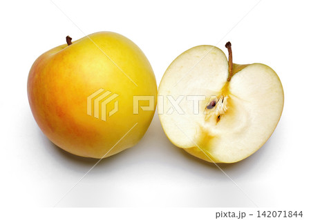 a whole flesh yellow-red orin apple isolated in white background with clipping path a whole flesh yellow-red orin apple isolated in white background with clipping path 142071844