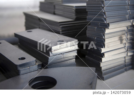 A thick sheet of metal cut on a plasma cutting machine. A thick sheet of metal cut on a plasma cutting machine. 142073059