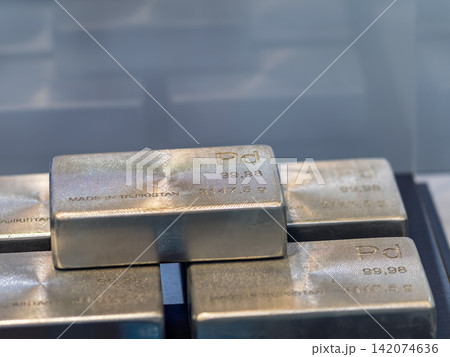 Stacked palladium ingots display high purity and value in a professional environment Stacked palladium ingots display high purity and value in a professional environment 142074636