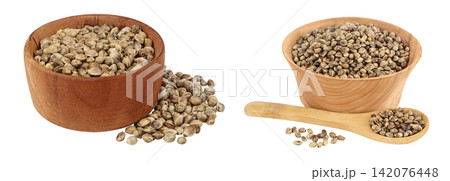 Hemp seeds in wooden bowl isolated on white background with full depth of field Hemp seeds in wooden bowl isolated on white background with full depth of field 142076448