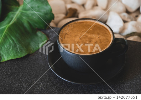 Minimalist Black Coffee Cup Close Up. 142077651