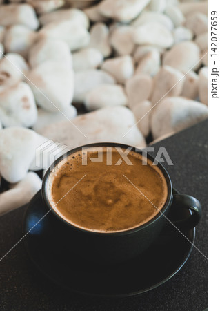Minimalist Black Coffee Cup Close Up. 142077659