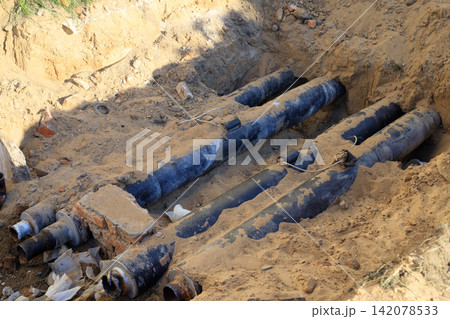 Pipeline Replacement Works with Insulated Pipes Exposed in Groun Pipeline Replacement Works with Insulated Pipes Exposed in Groun 142078533
