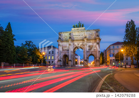 Munich Siegestor Victory Gate at night with red car light trails Bavaria Munich Siegestor Victory Gate at night with red car light trails Bavaria 142079288