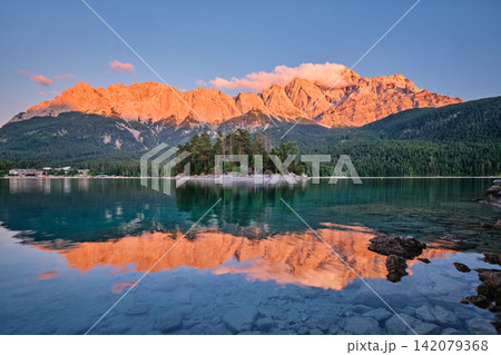 Twilight at Eibsee lake with Zugspitze mountain and small island Germany 142079368