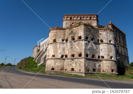 Ancient bastion and ruined palace wall of Medzhybizh fortress in Ukraine Ancient bastion and ruined palace wall of Medzhybizh fortress in Ukraine 142079787