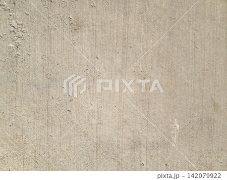 Textured Light Tan Concrete Surface with Fine Grooves Textured Light Tan Concrete Surface with Fine Grooves 142079922