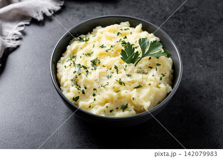 Creamy mashed potatoes with fresh parsley Creamy mashed potatoes with fresh parsley 142079983