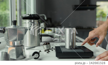 stainless grinder with powder coffee roasted for espresso coffee .home preparation drink stainless grinder with powder coffee roasted for espresso coffee .home preparation drink 142081328