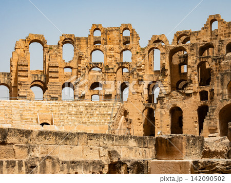 Impressive ruins of the largest colosseum in North Africa, huge Roman amphitheater in small village of El Jem, Tunisia 142090502