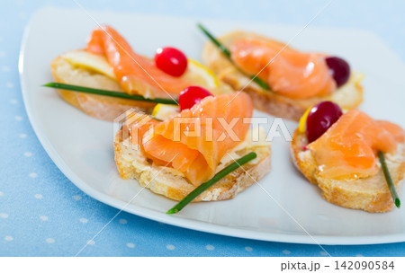 Bruschettes with salmon Bruschettes with salmon 142090584