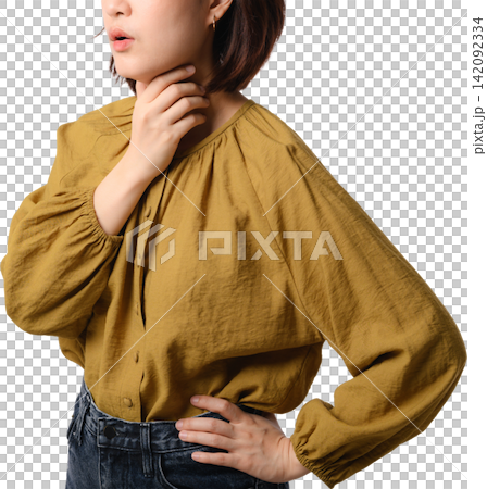 Young sick asian woman touching painful throat feeling sore unwell in yellow blouse standing isolated on white studio background Young sick asian woman touching painful throat feeling sore unwell in yellow blouse standing isolated on white studio background 142092334