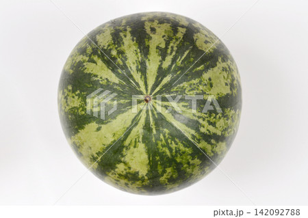 Whole striped watermelon on white background 142092788