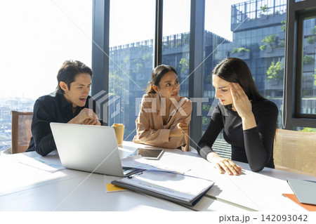 Group Of businessmen and women Having Argument At Workplace. Multinational worker having conflict working problem. 142093042
