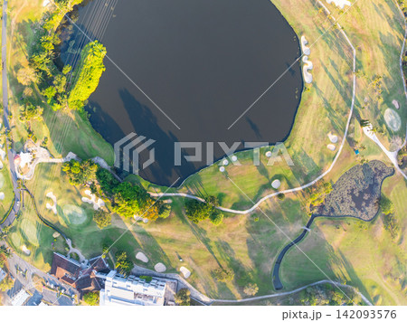 Aerial view drone shot of beautiful golf field in Phuket Thailand Aerial view drone shot of beautiful golf field in Phuket Thailand 142093576