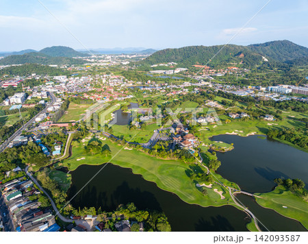 Aerial view drone shot of beautiful golf field in Phuket Thailand Aerial view drone shot of beautiful golf field in Phuket Thailand 142093587