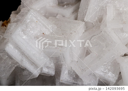macro mineral fluorite stone on black background macro mineral fluorite stone on black background 142093695