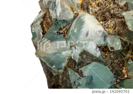 Macro stone Fluorite mineral on white background Macro stone Fluorite mineral on white background 142093701