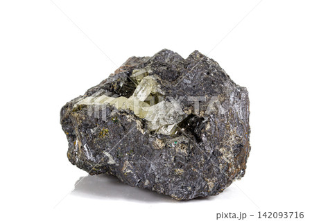 Macro stone Apatite mineral on white background Macro stone Apatite mineral on white background 142093716