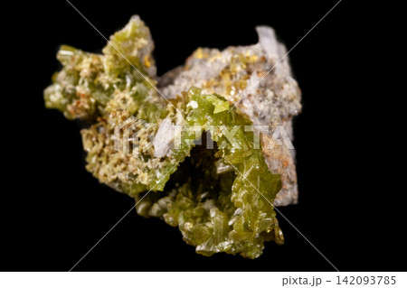 Macro Pyromorphite mineral stone on a black background 142093785