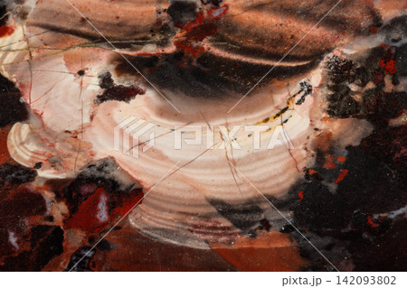 macro stone mineral jasper on black background macro stone mineral jasper on black background 142093802