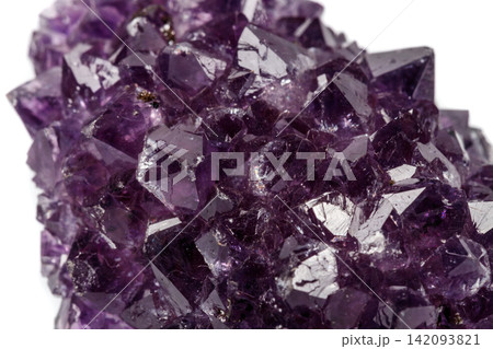 Macro mineral stone Amethysts eye crystals on white background Macro mineral stone Amethysts eye crystals on white background 142093821