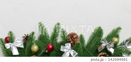 Christmas background with fir branches and Christmas decor. Top view, copy space for text 142094981