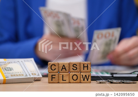 Exploring financial success with cash flow management in a modern office setting Exploring financial success with cash flow management in a modern office setting 142095650